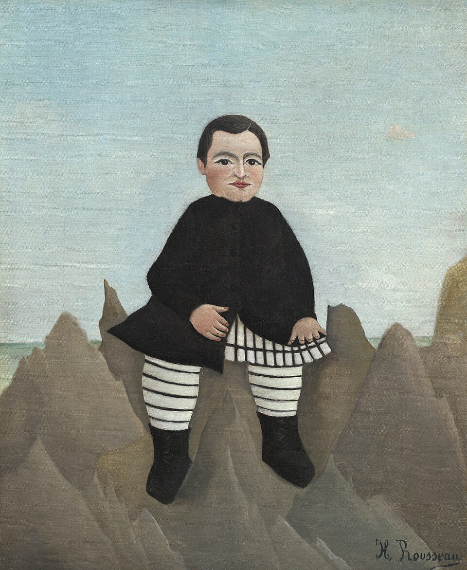 岩の上の子供