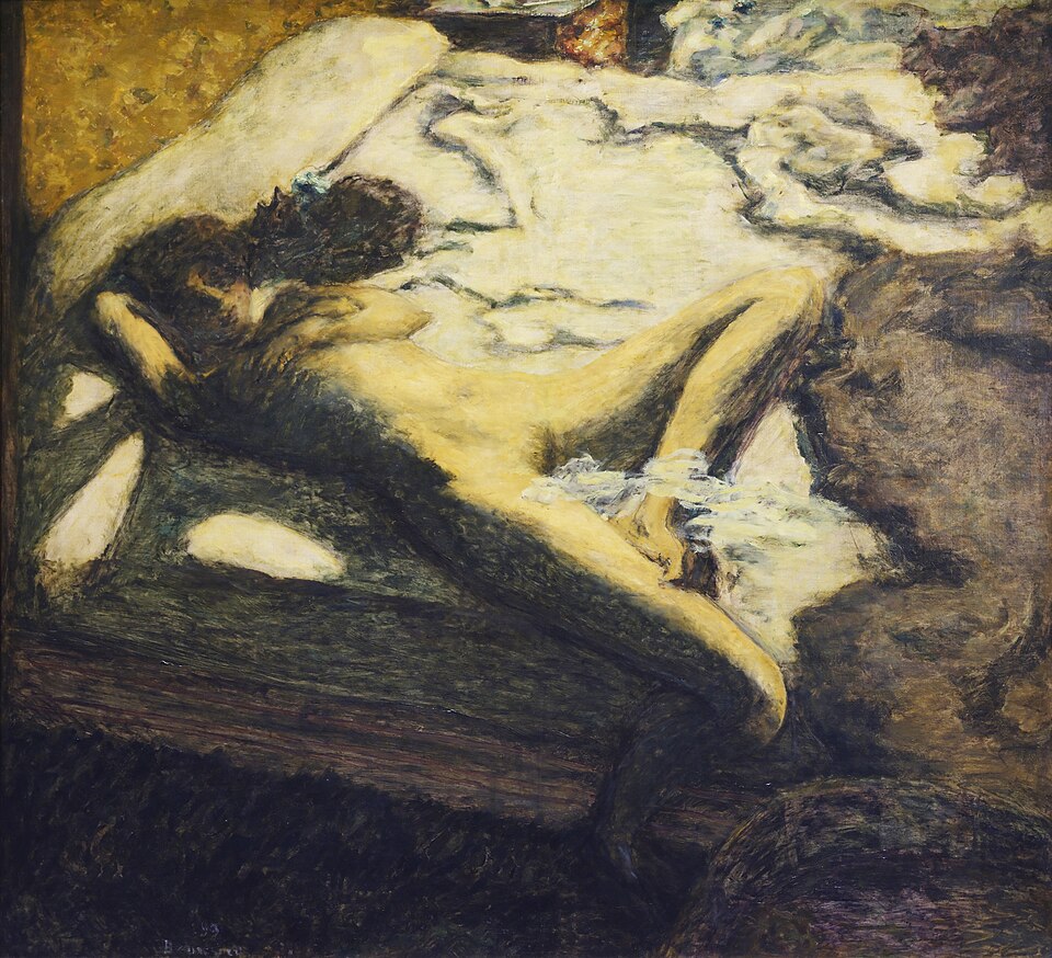 Sleeping woman on a bed