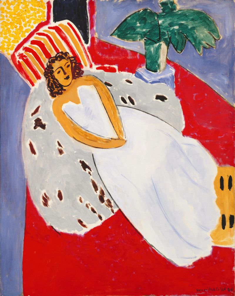 Young Woman in White on a Red Background