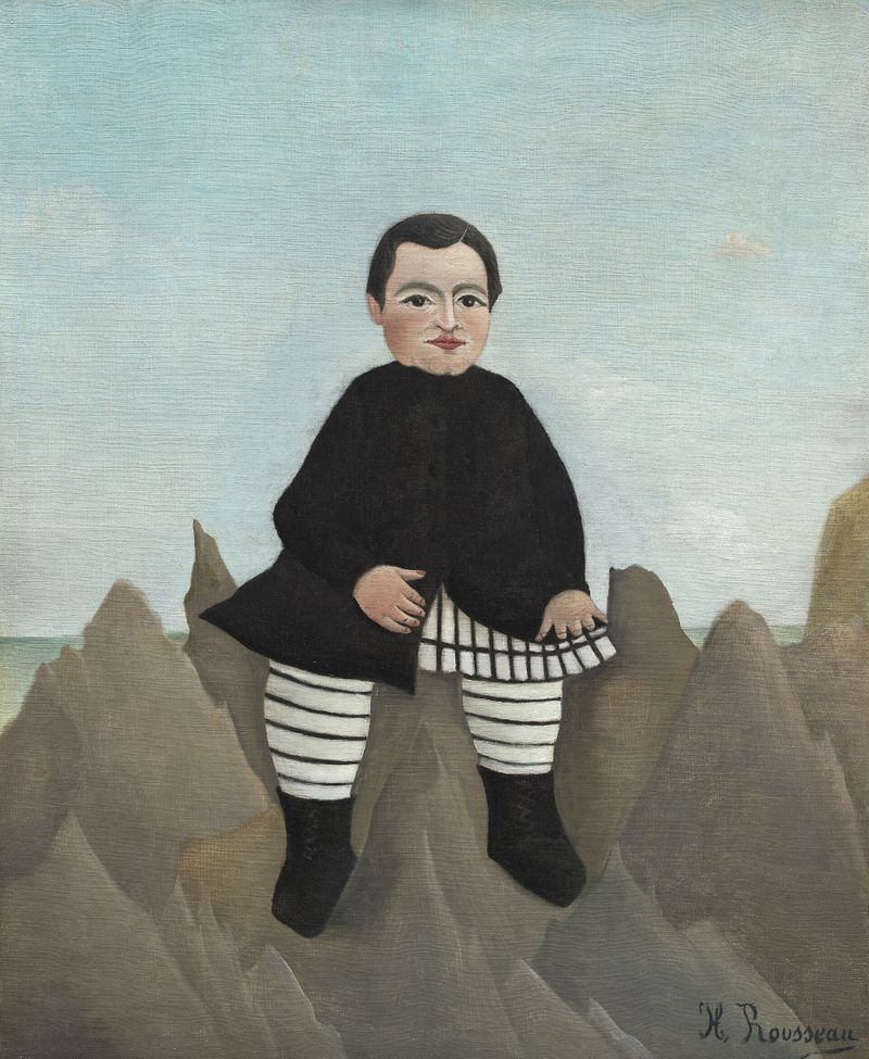 岩の上の子供