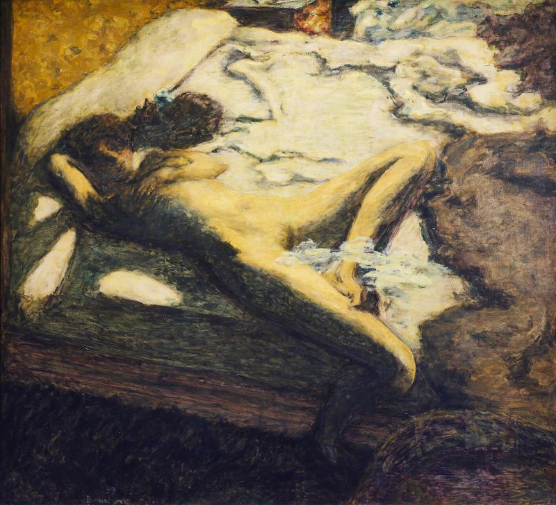 Sleeping woman on a bed